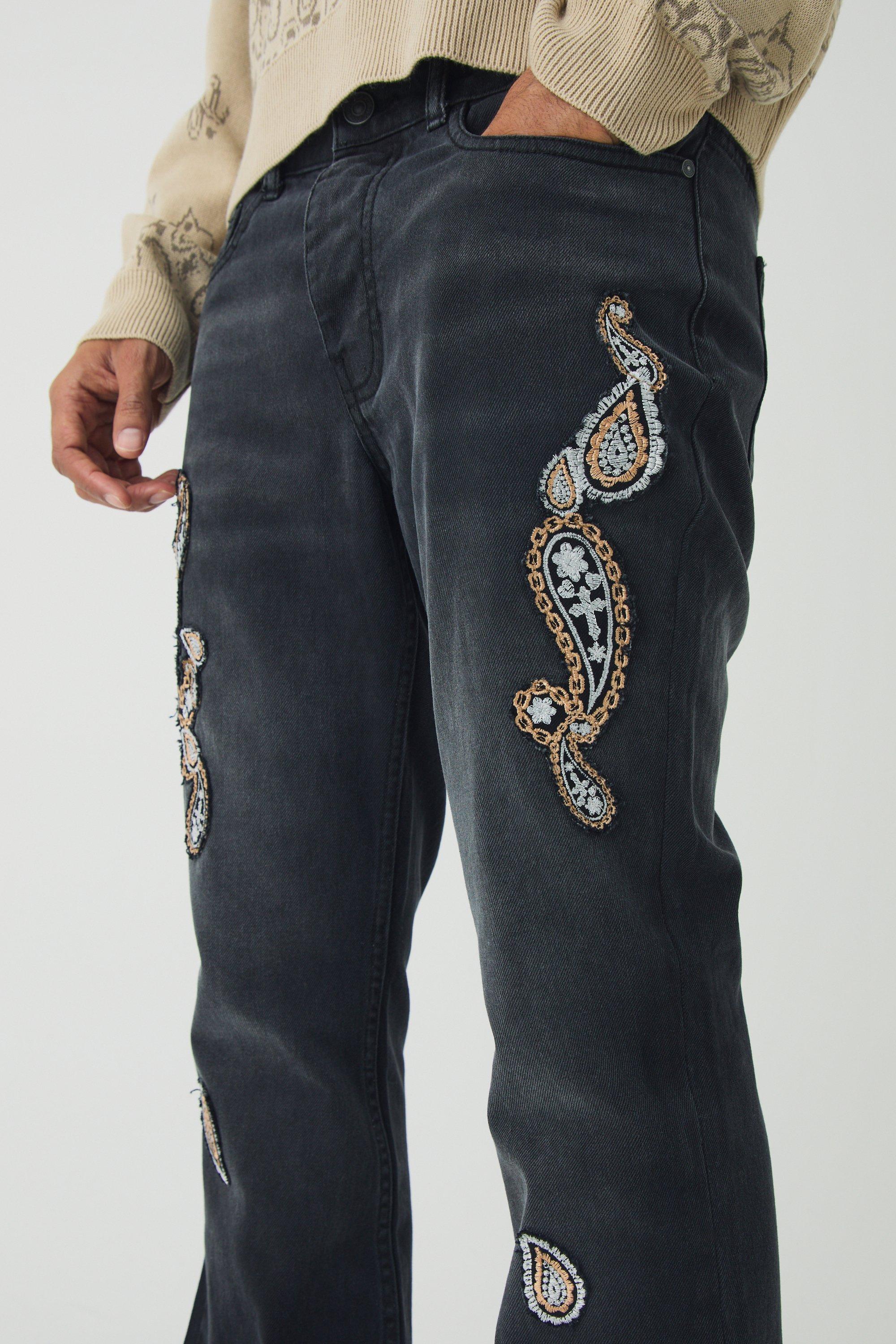 Jeans a zampa Slim Fit in denim rigido slavato con applique in fantasia cachemire